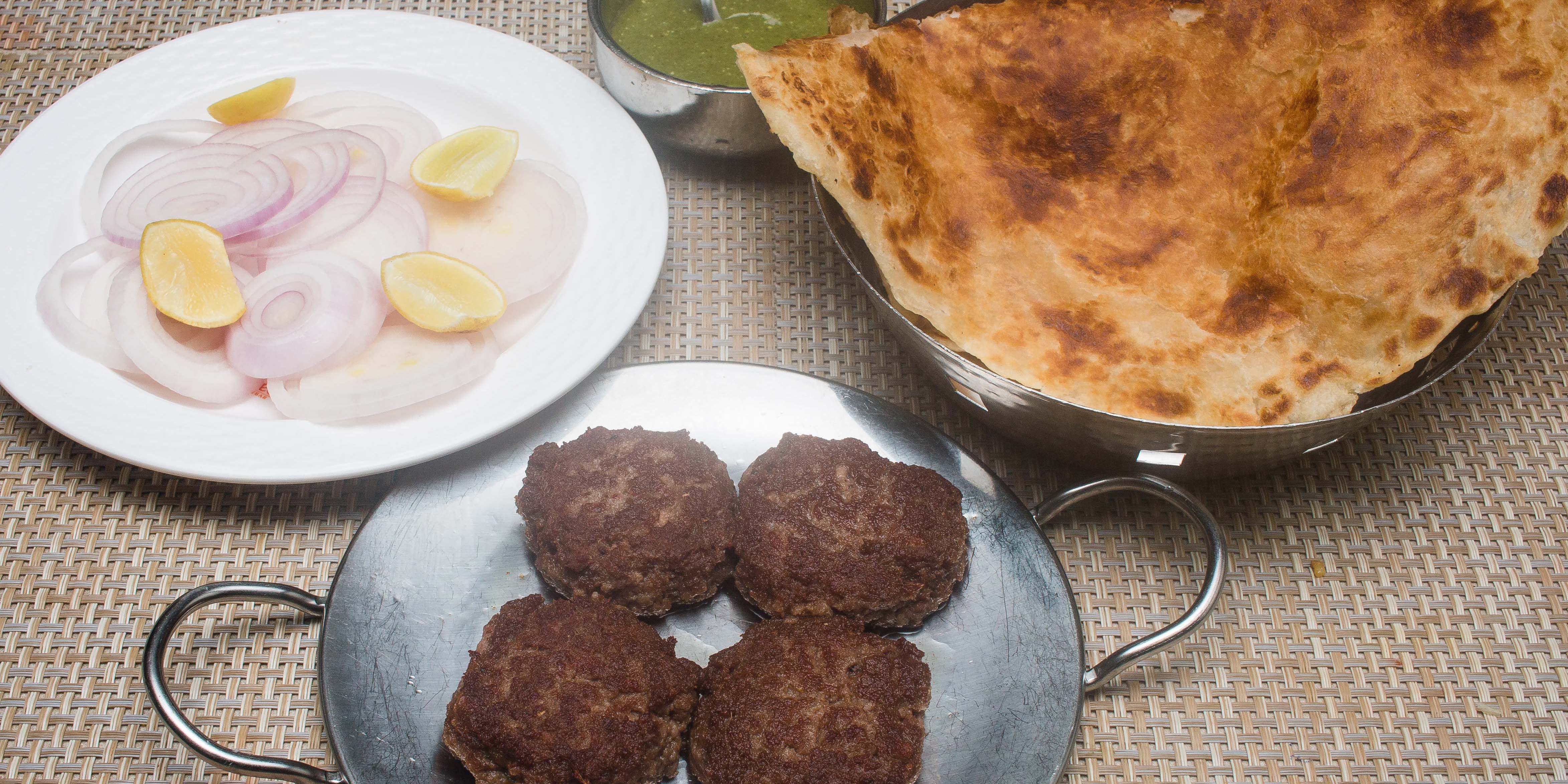 Lucknowee Tunday Kebab - Logo