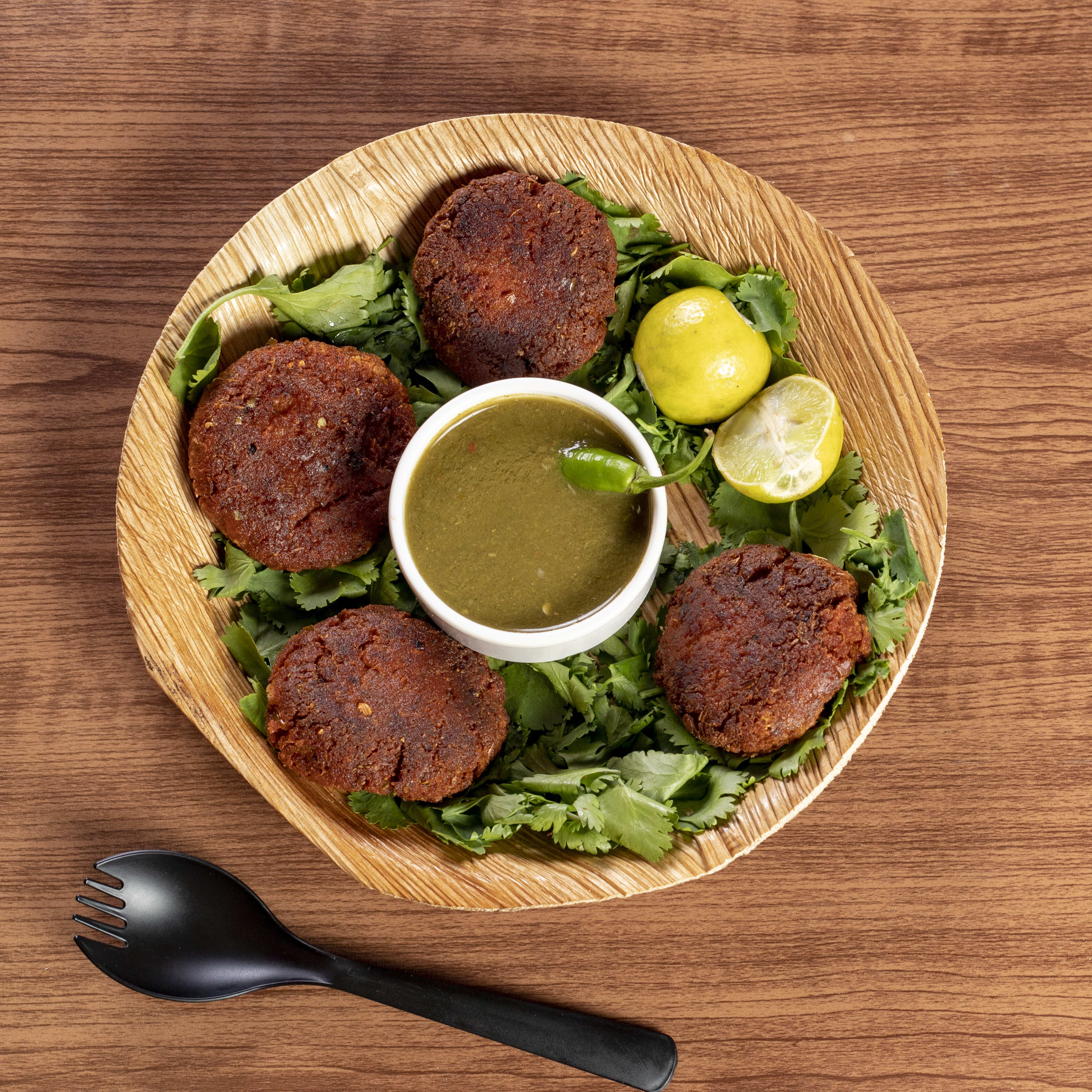 Lucknowi Tunda Kabab - Logo