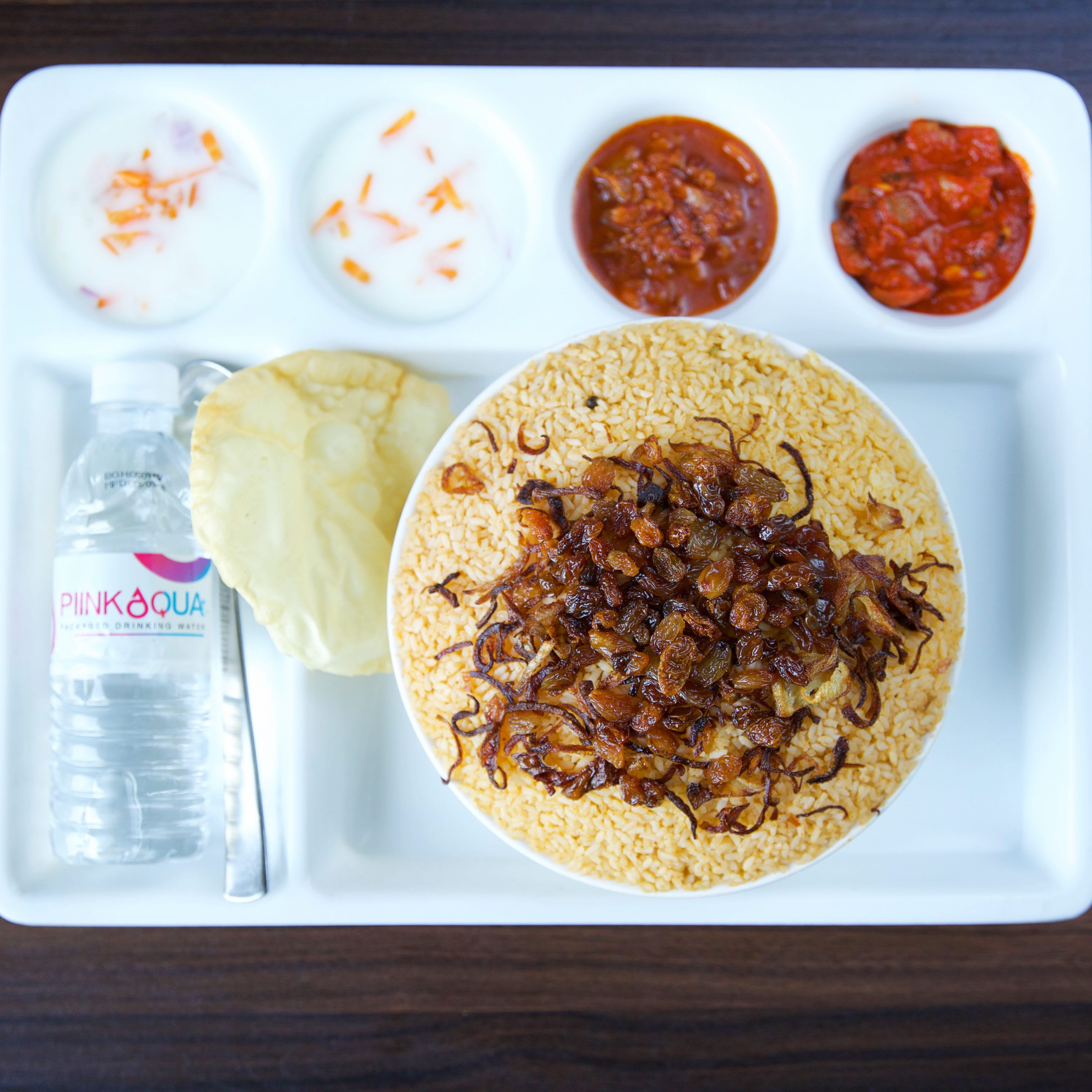 Maam Biriyani Hut - Logo