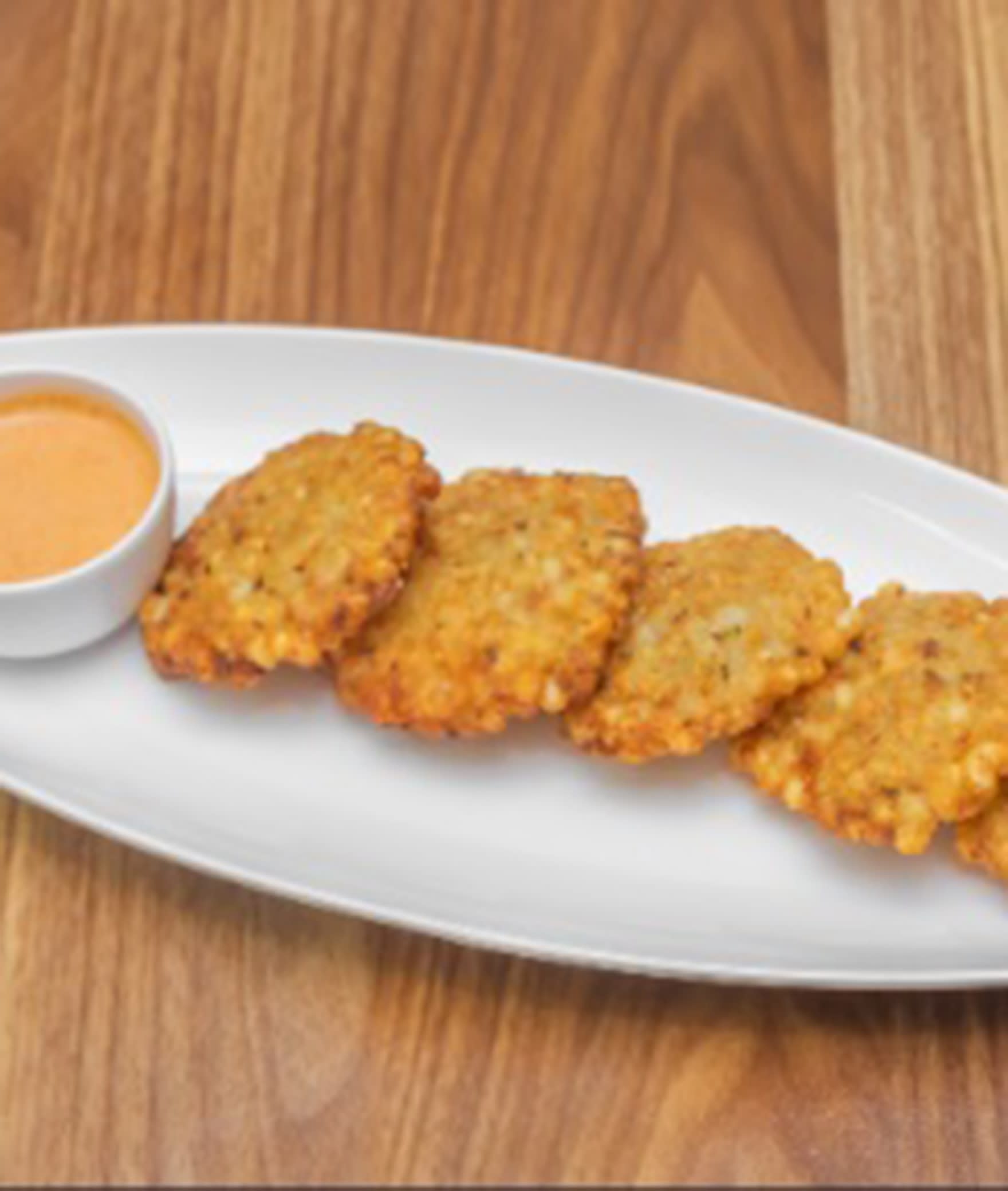 Madhavis Kitchen Food - Logo