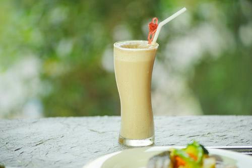 MADHAV JUICE CORNER AND BAKERS - Logo