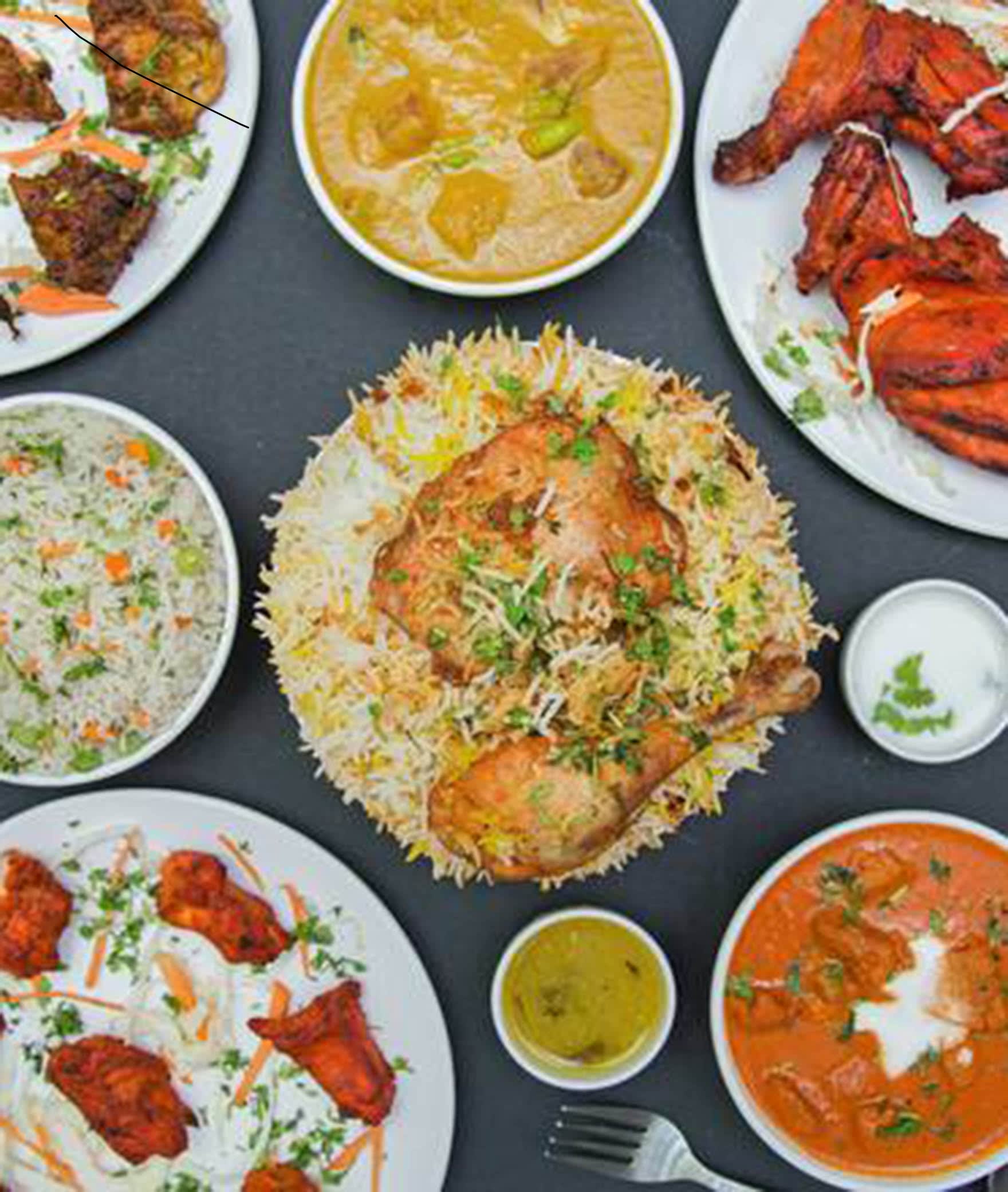 Madhu Family Restaurant - Logo