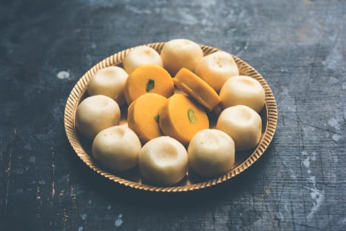 Madhuram Sweets and Farsan - Logo