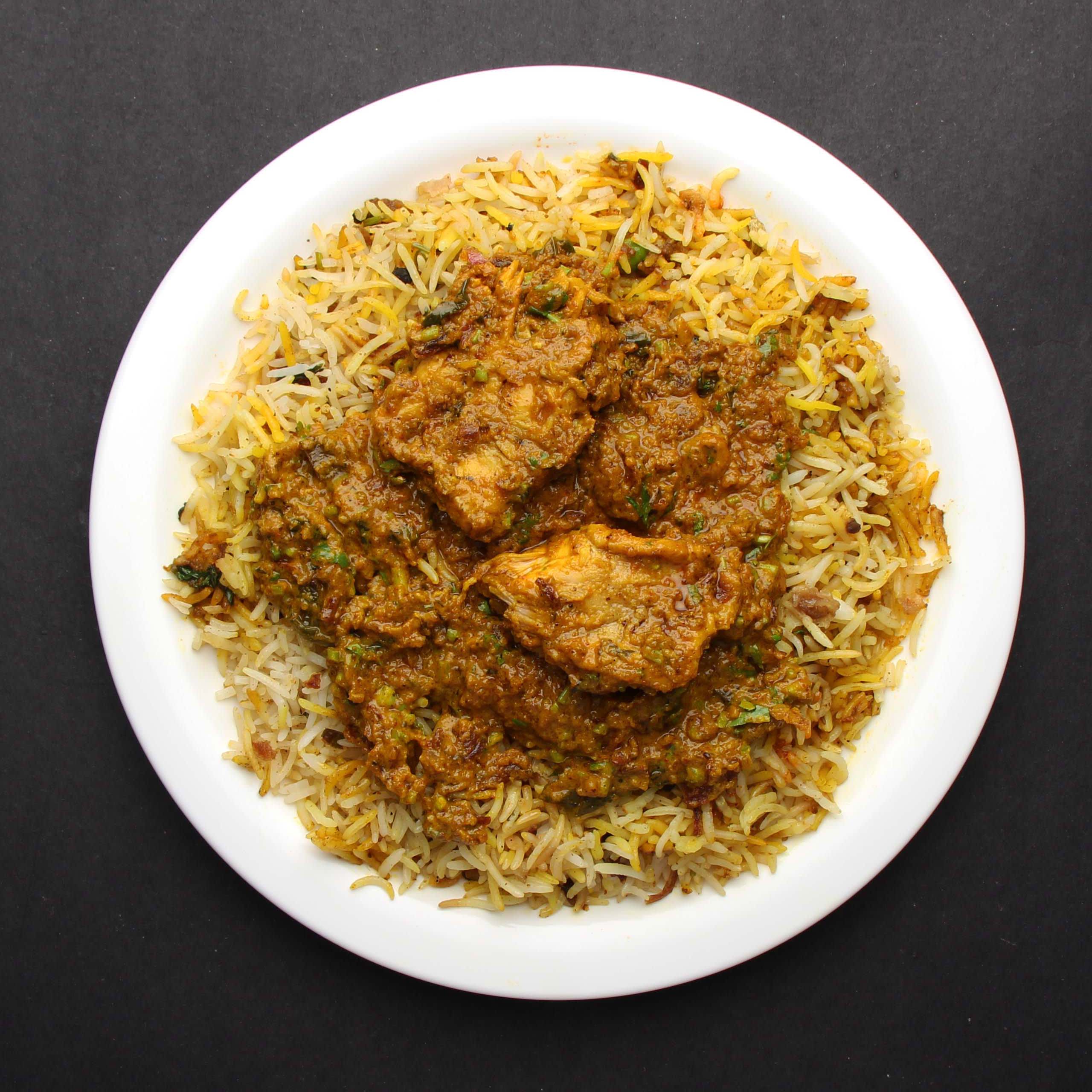 Madhu Restaurant - Logo