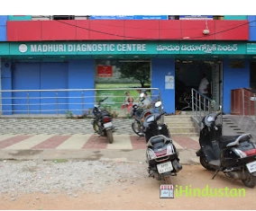 Madhuri Diagnostics Centre - Logo