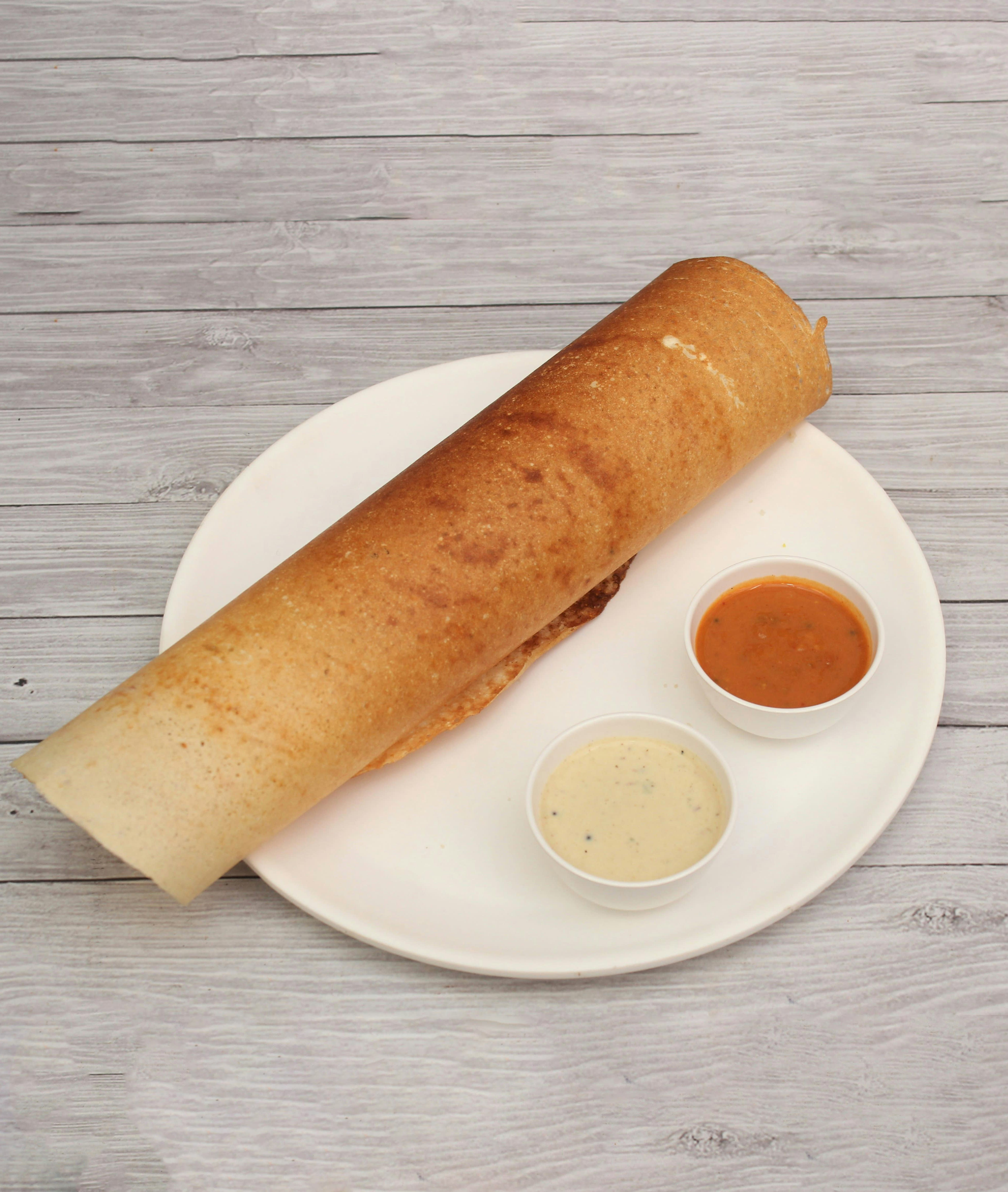 Madras Cafe - The Taste Of Town - Logo