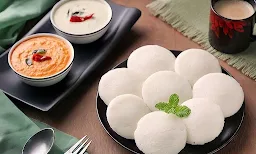 Madras Idli Tiffin Centre - Logo