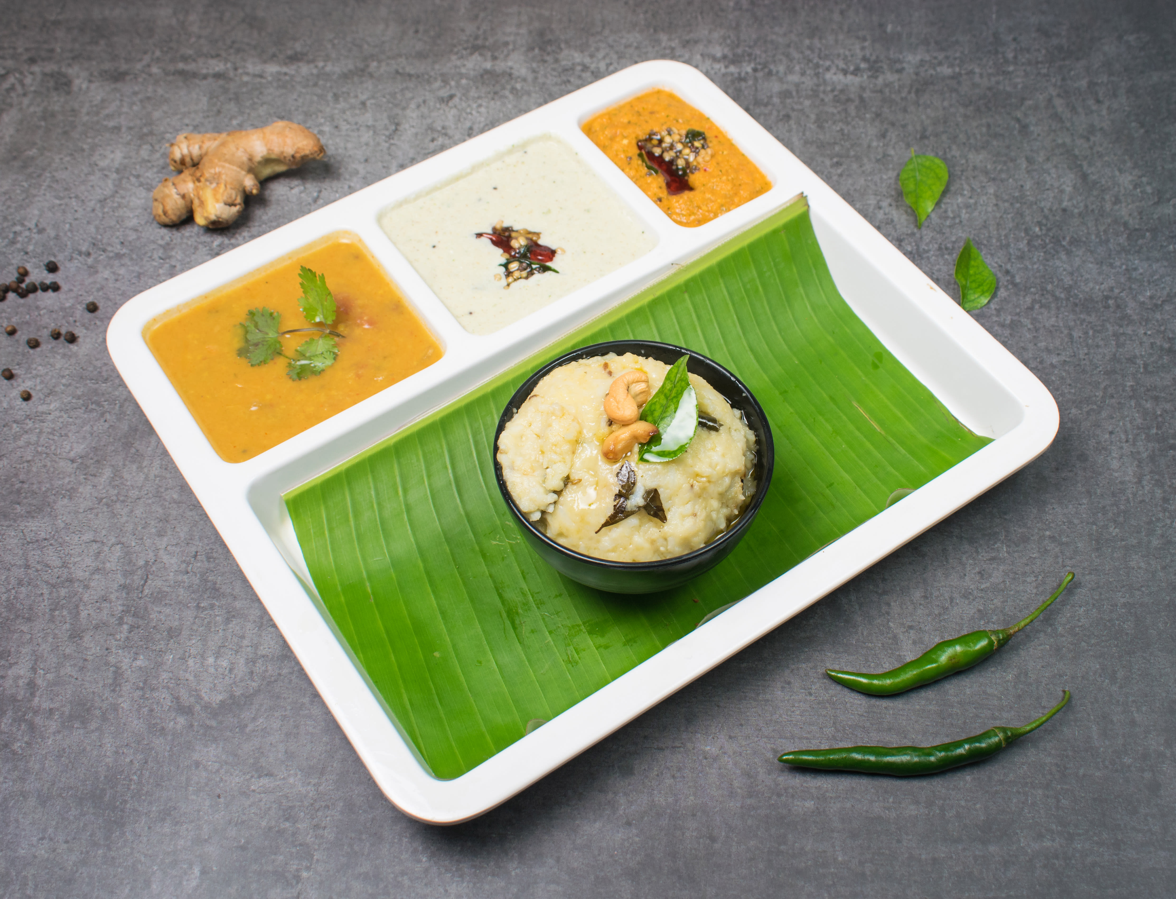 Madras Idli Tiffin Centre - Logo