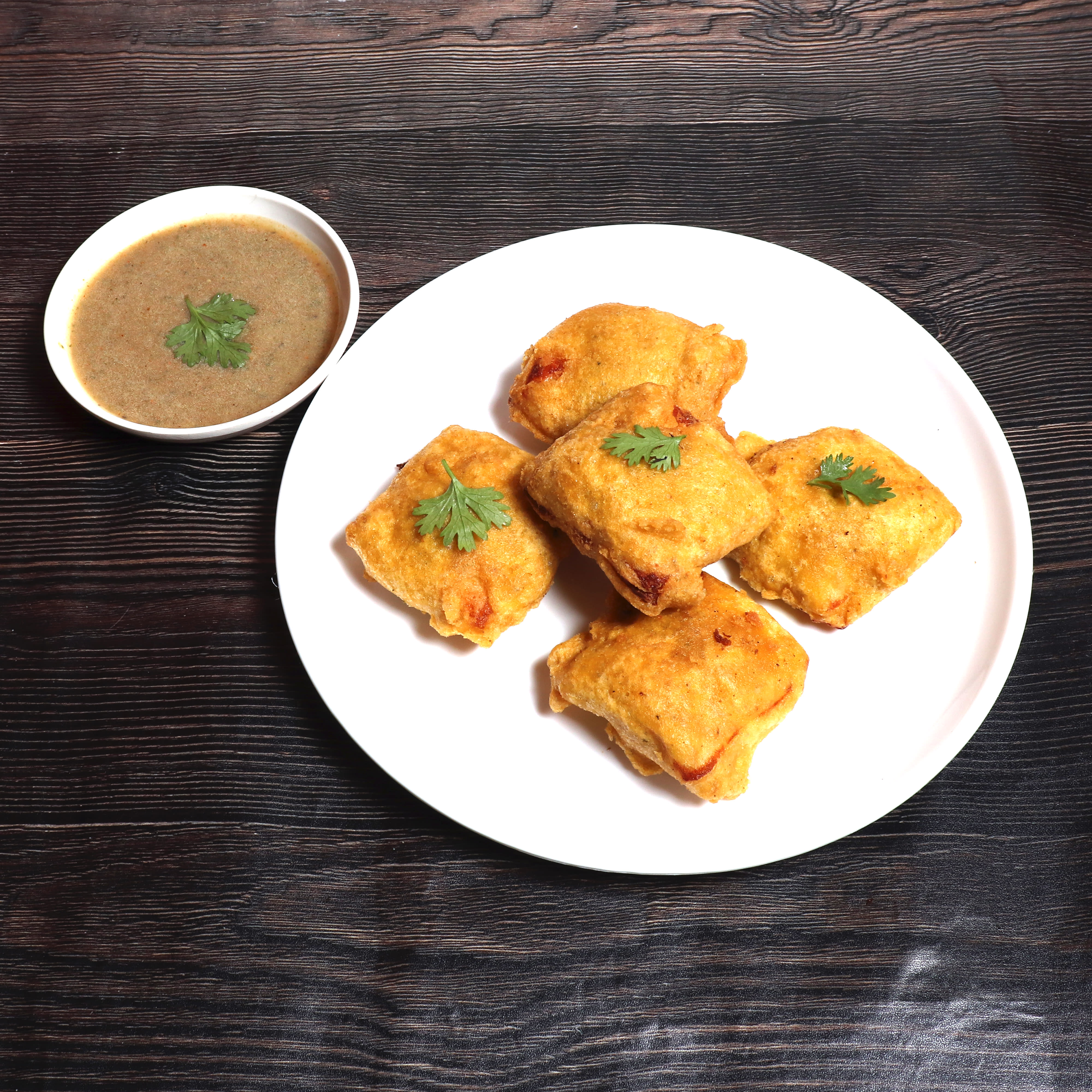Madrasi Pakode - Logo
