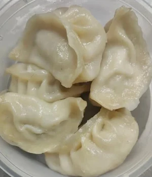 Magical Momos - Logo