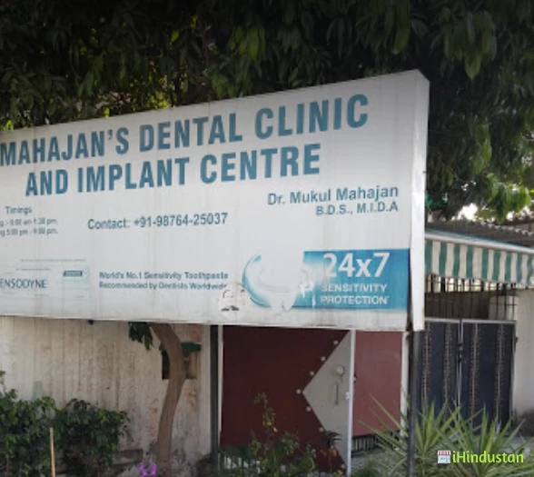 Mahajan Dental Clinic and implant center - Logo