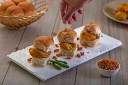 Mahalaxmi Uphar Gruh Nashta & Mithai - Logo