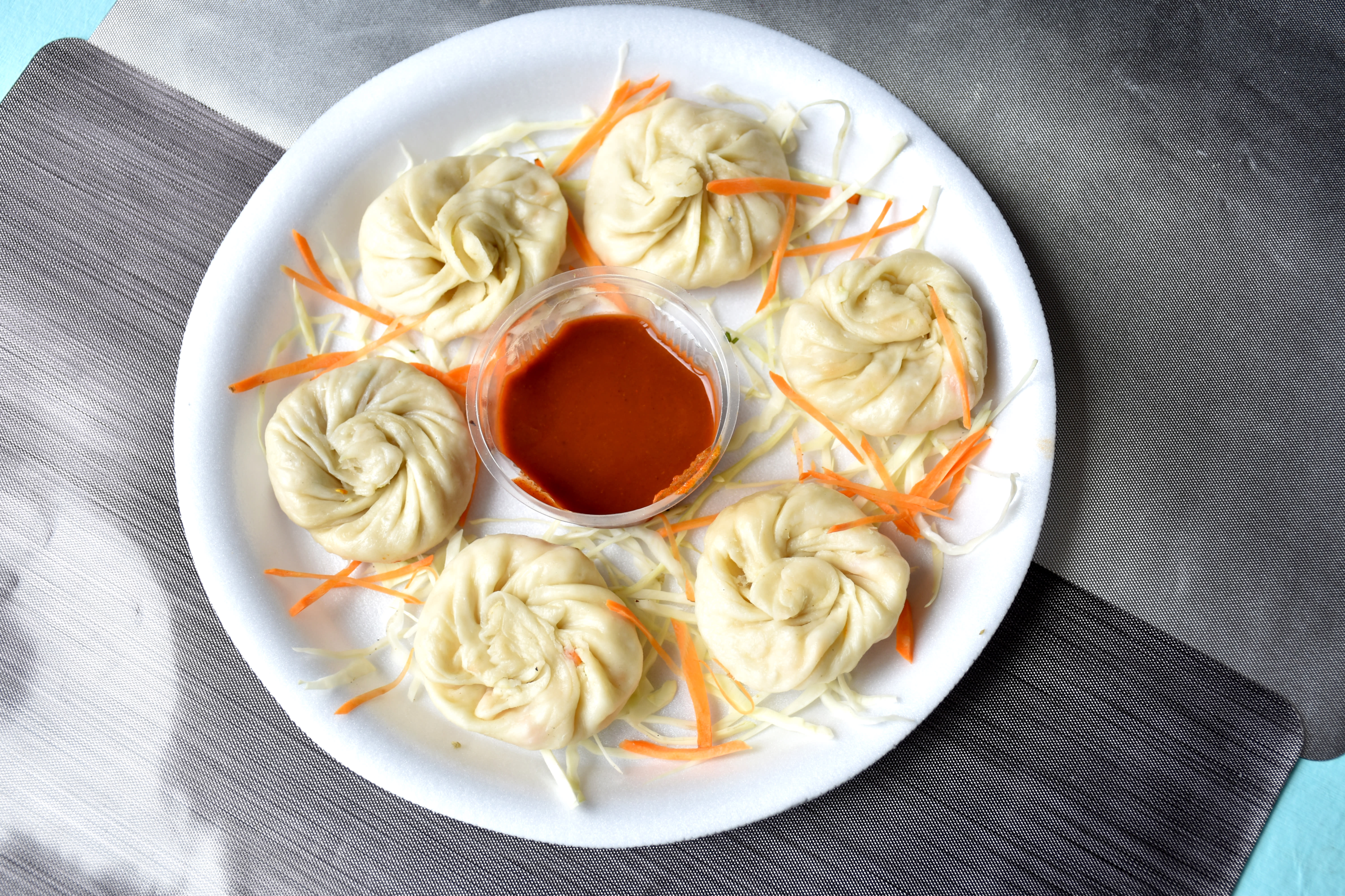 Mahi Momos - Logo