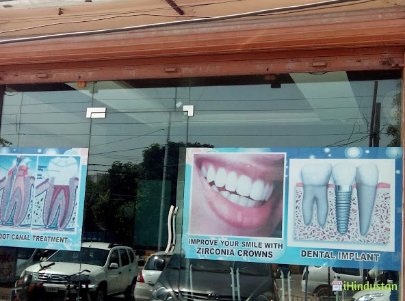 Malhan Dental Clinic&Implant Centre - Logo