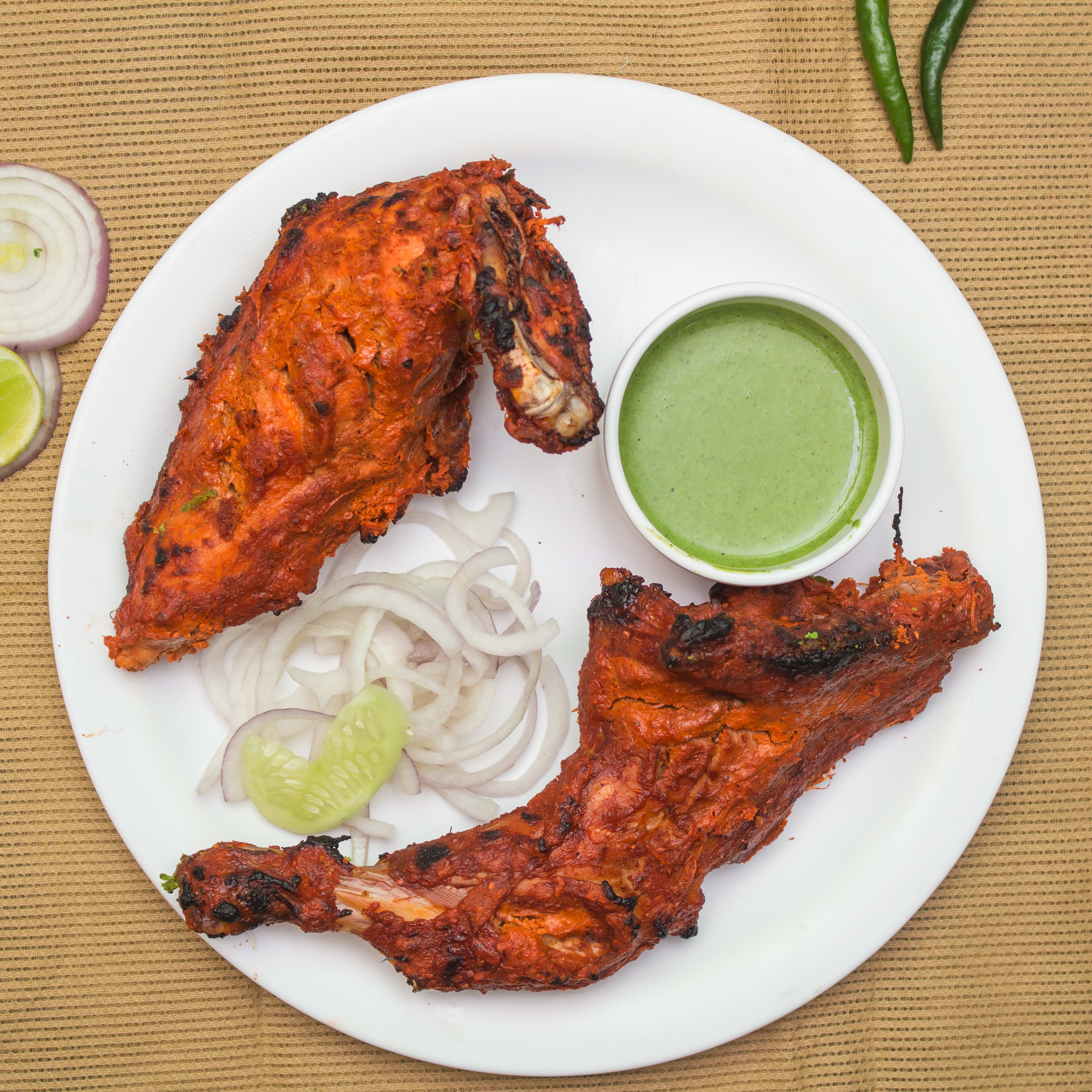 Malik Restaurant - Logo