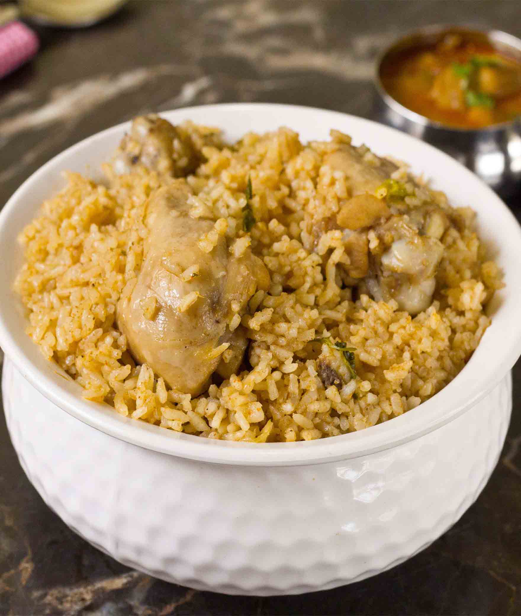 Manapatty Murugesan Biryani - Logo