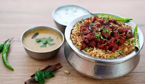 Mani's Dum Biryani - Logo