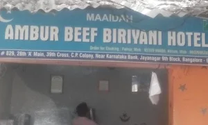 Mani's Dum Biryani - Logo