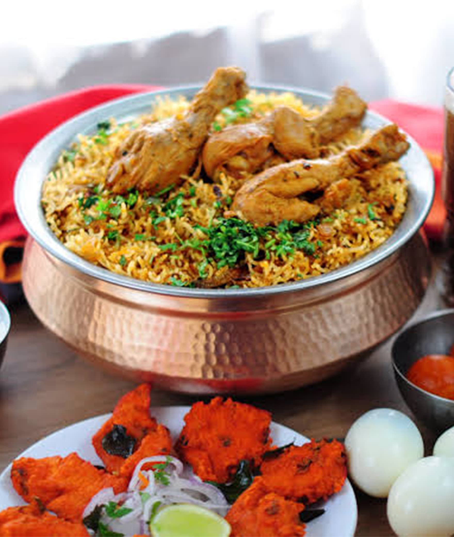Mani's Hydrabadi Dum Biryani - Logo