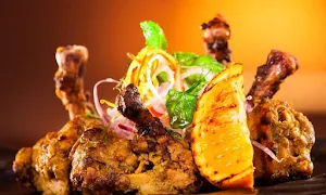 Manjeet Kitchen - Logo