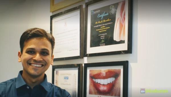 Manudhane Dental Clinic - Logo