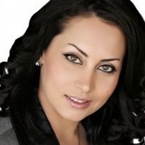 Marcy Balouch - Sutton Group-Premier Realty (2008) Ltd - Logo