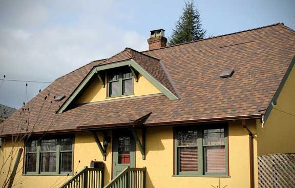 McMann and Sons Roofing and Contracting - Logo