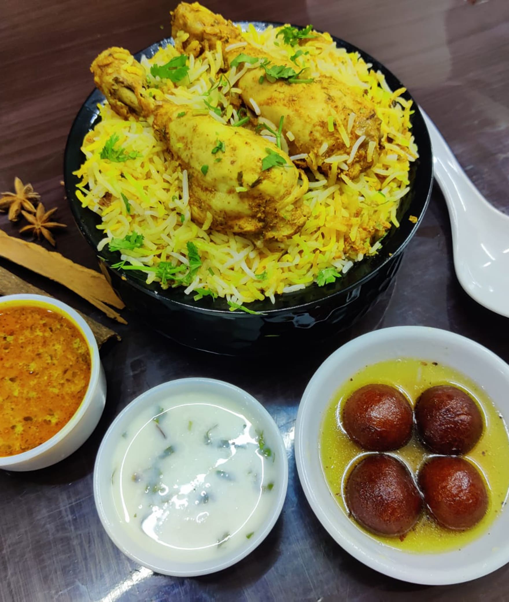 Mehek Biryani - Logo