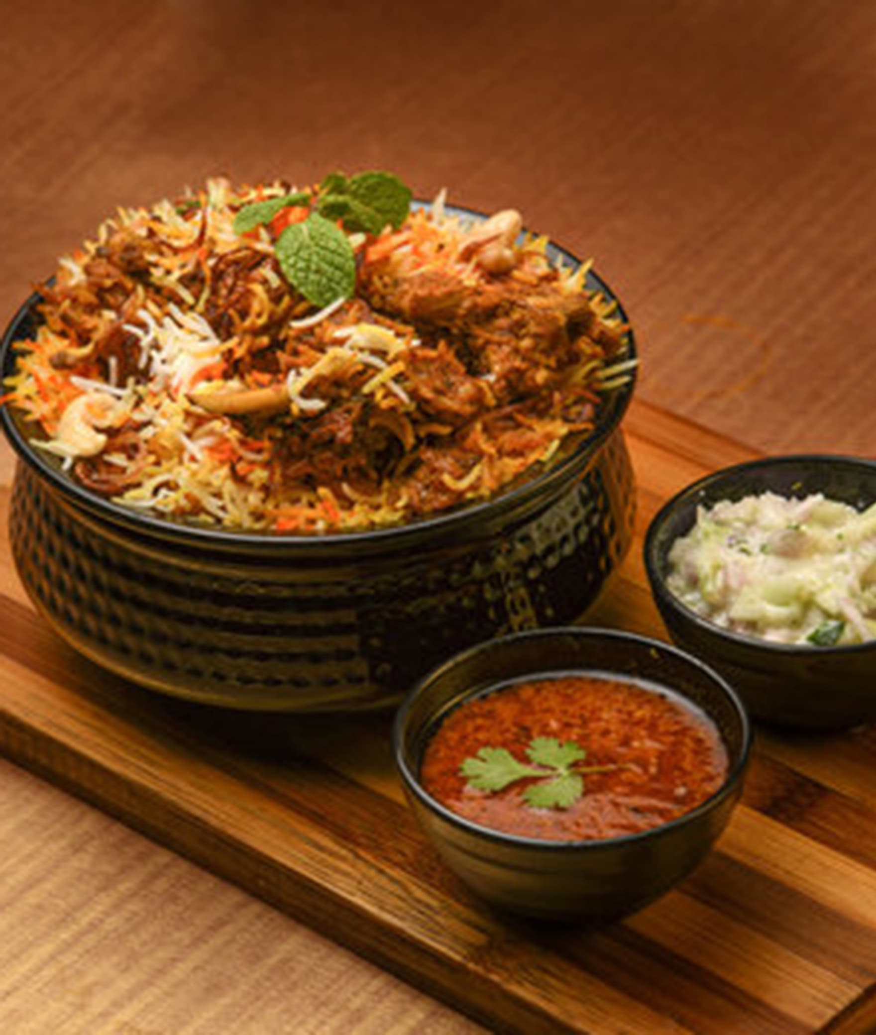 Mela Restaurant - Logo