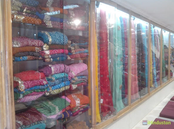 Menka Sarees - Logo