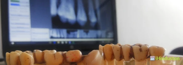 Menwal dental clinic and implant centre - Logo