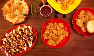 Mexico's Chicken Poppers & The Egg Stop - Logo