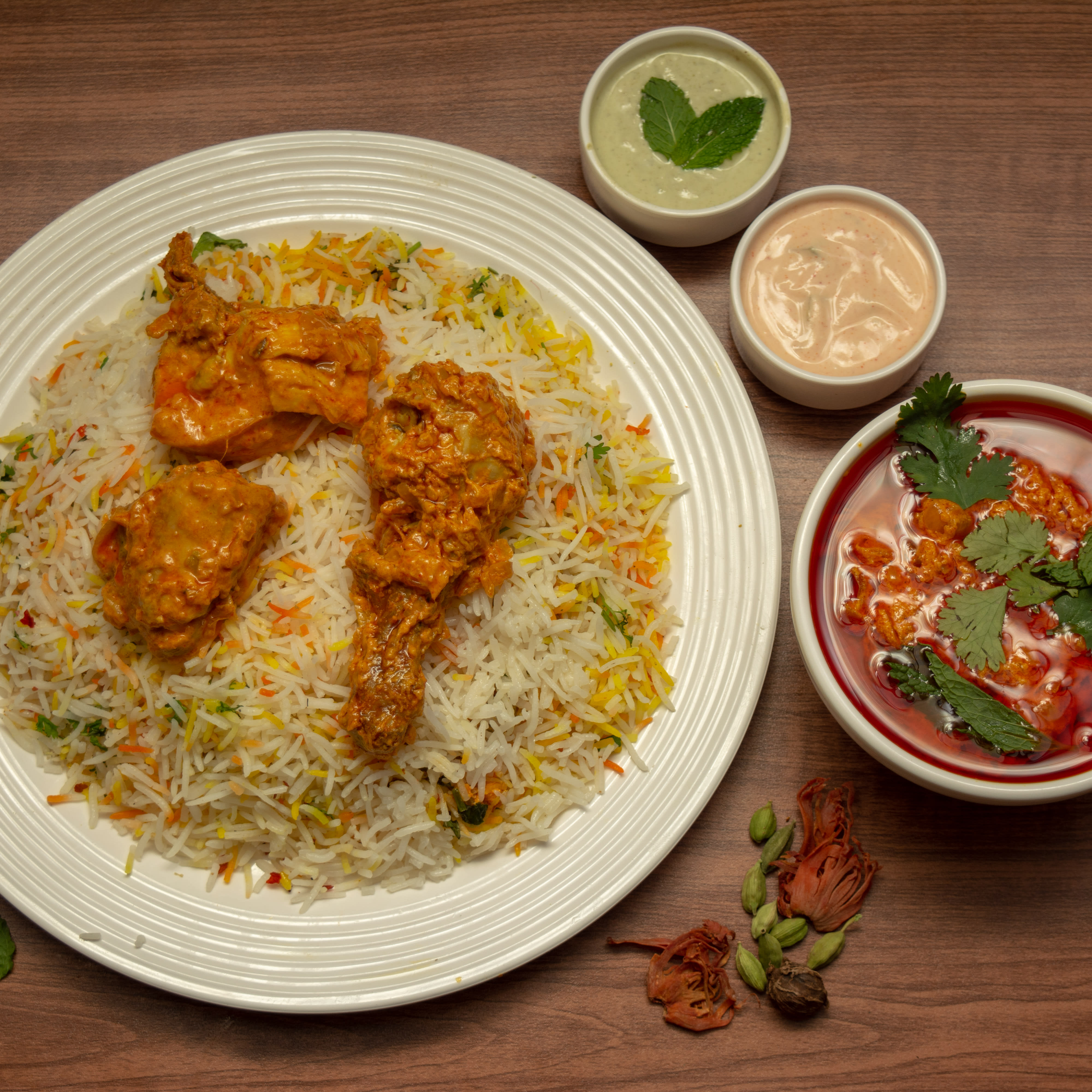 Mezbaan Biryani - Logo