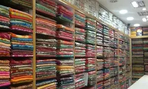 Milan Sarees - Logo