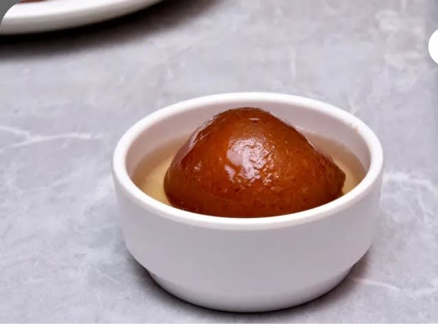 Milan Sweets and Namkeen - Logo