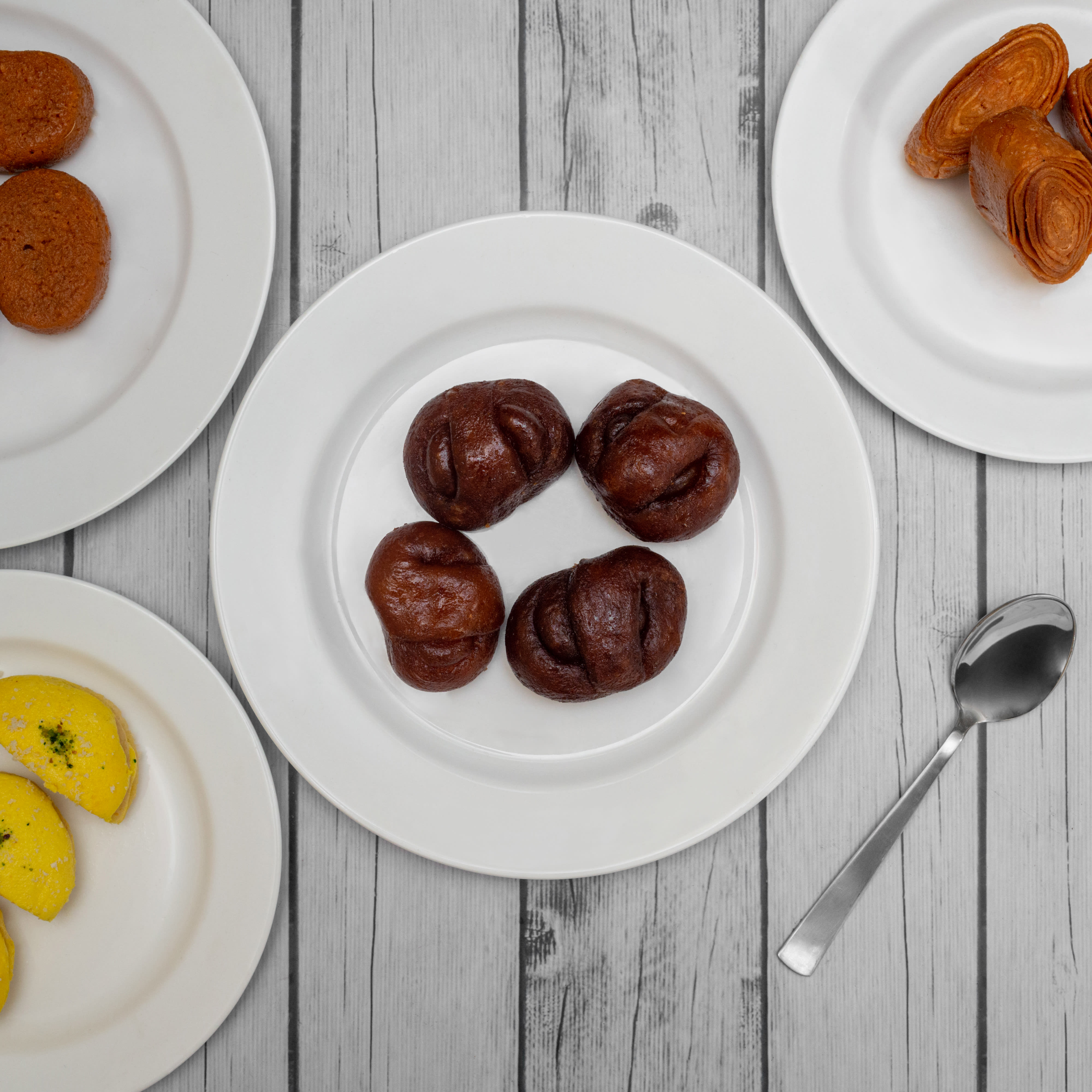 Mishti sweets n snacks - Logo