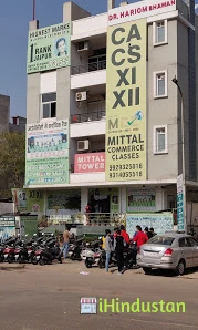 Mittal Commerce Classes - Logo