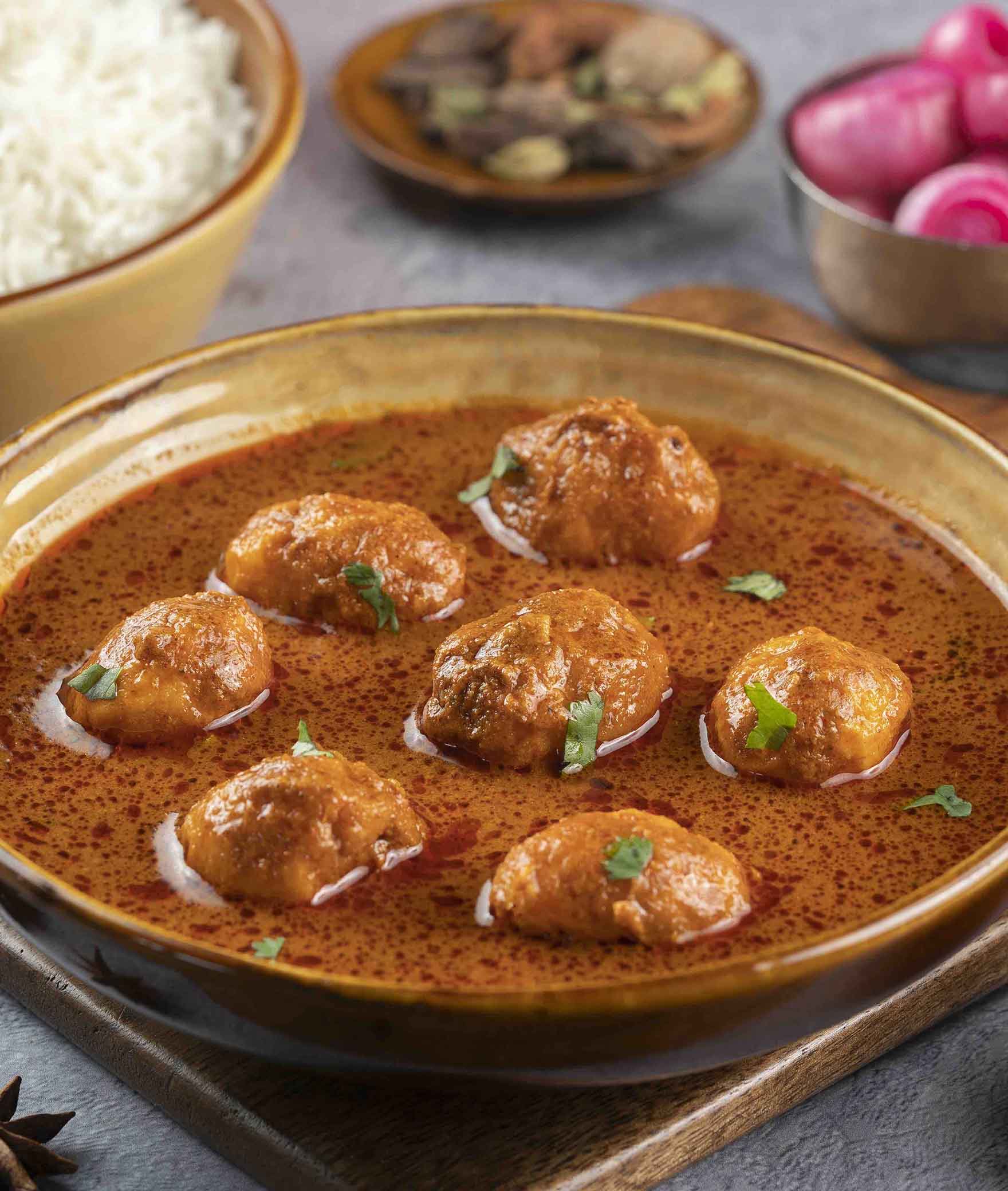 Moets The Indian Curry - Logo