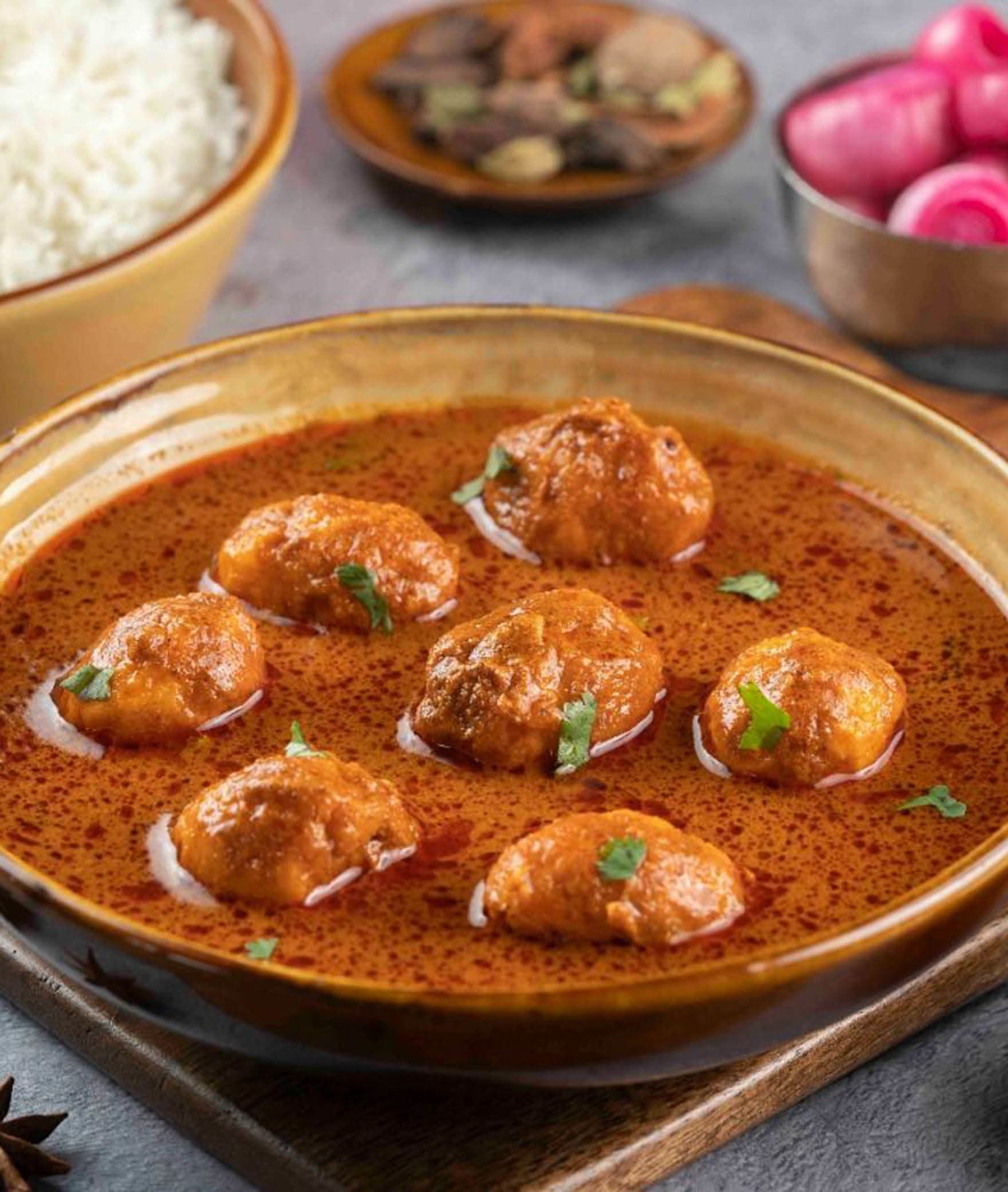 Moets The Indian Curry - Logo