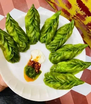 Momos Babe - Cover photo