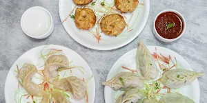 Momos House - Cover photo