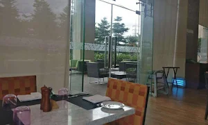 Momo Cafe - Courtyard By Marriott Pune Chakan - Cover photo