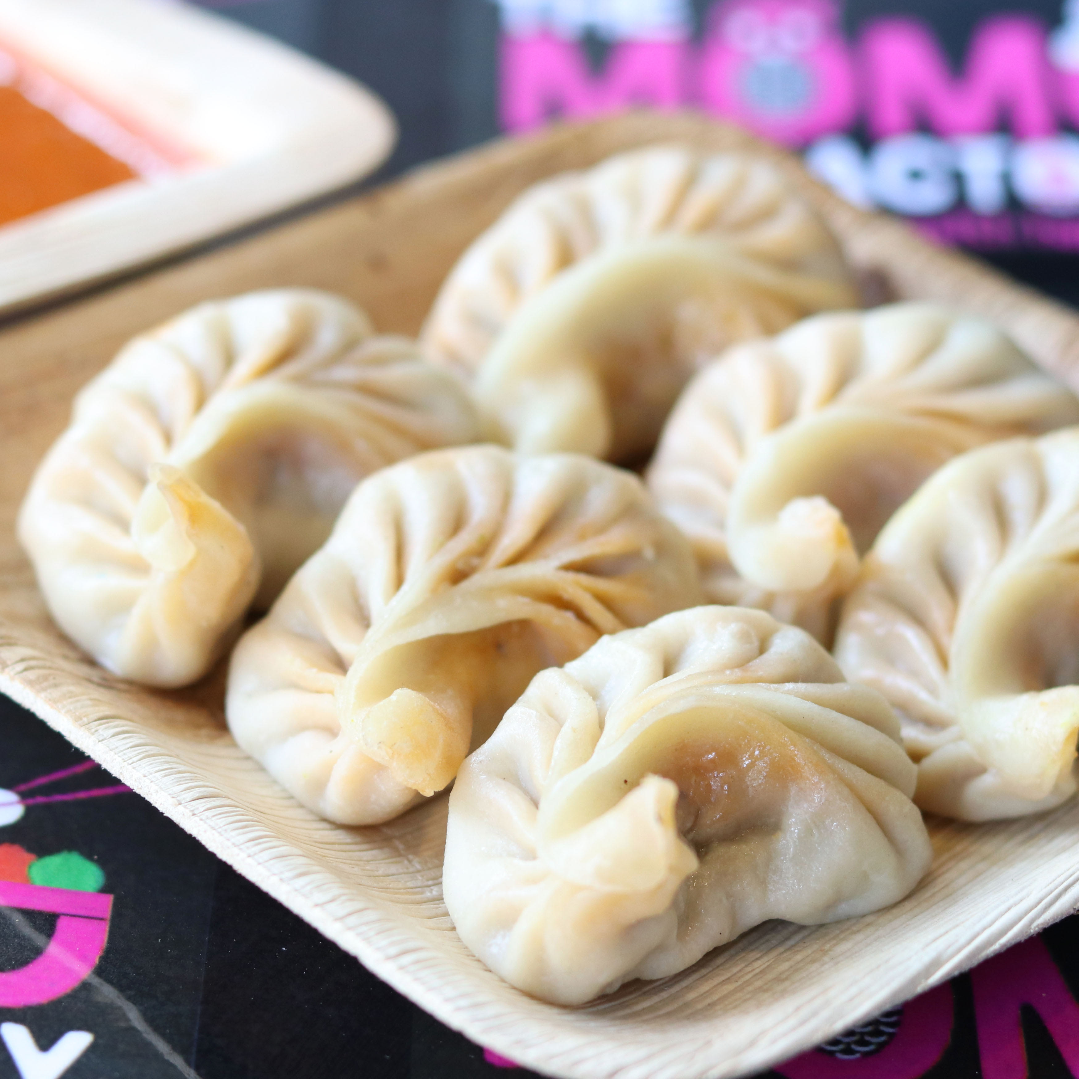 Momos 20 - Logo