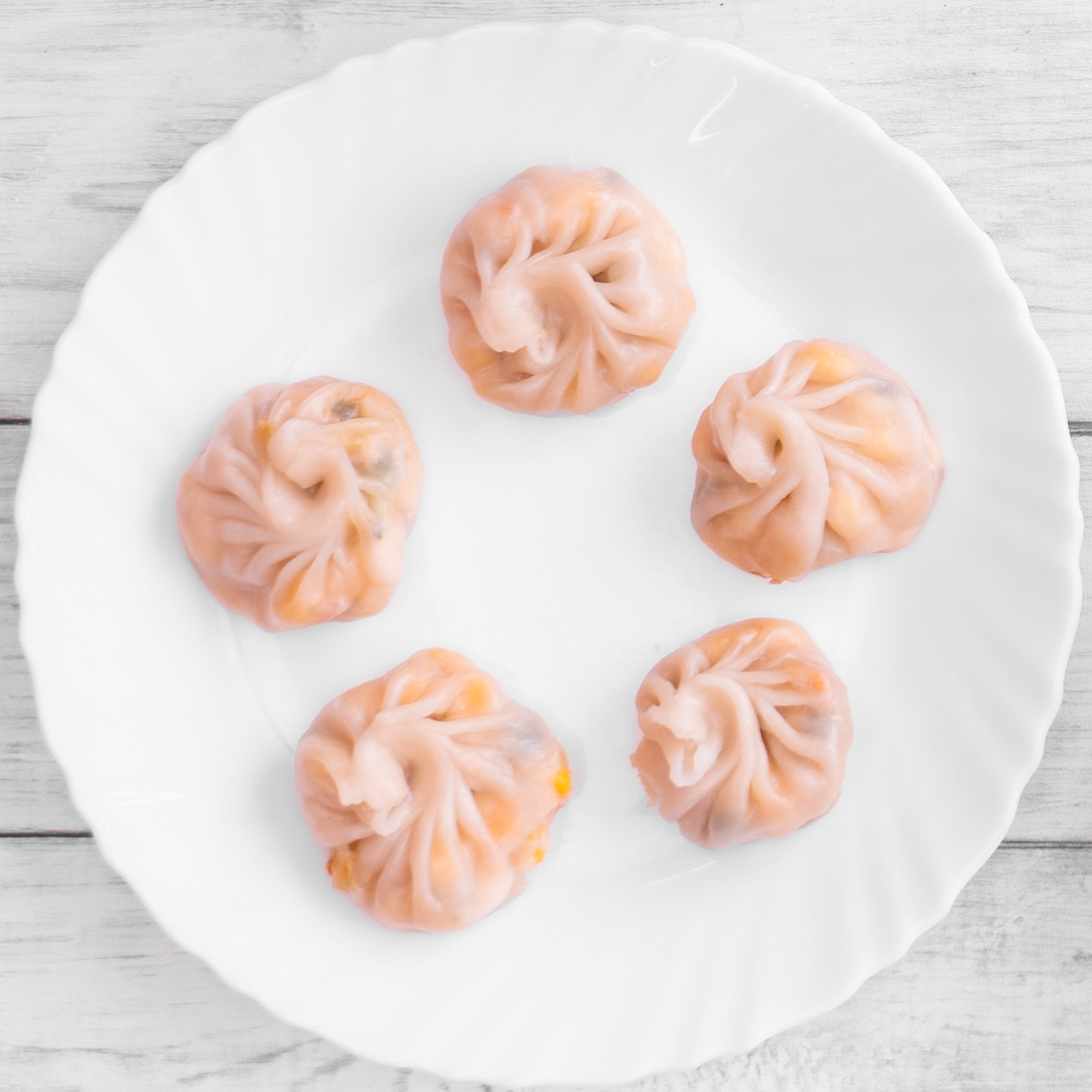 Momos Addaa - Logo