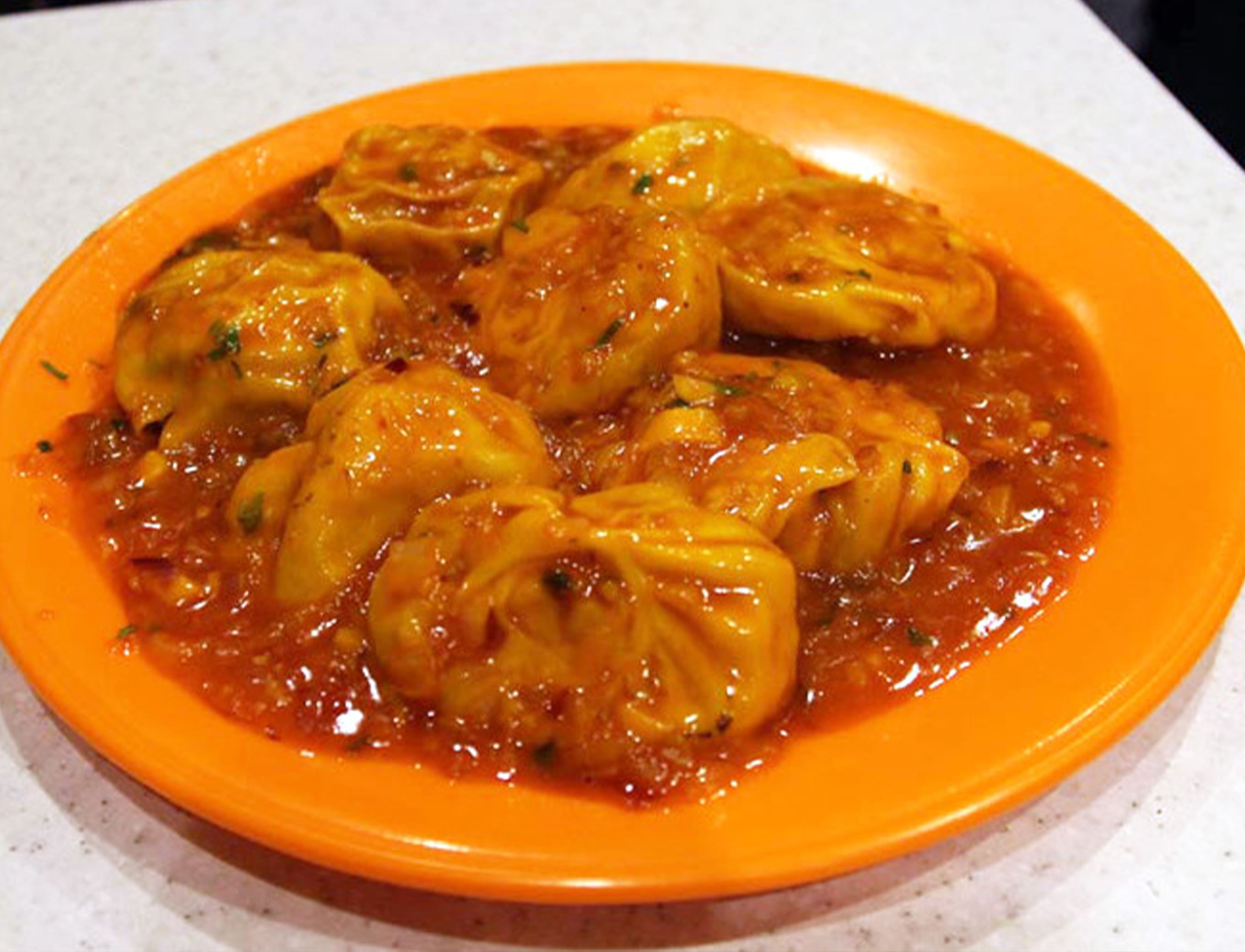 Momos Boi - Logo
