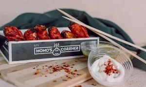 Momo's Corrner - Logo