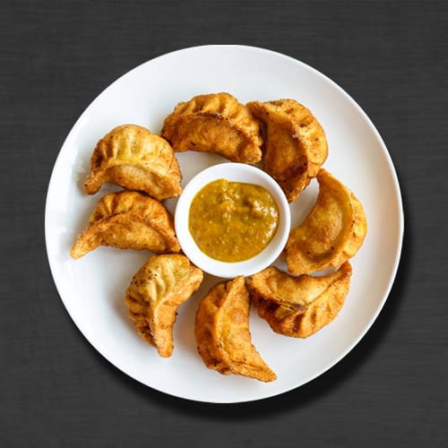 Momos Chimney - Logo