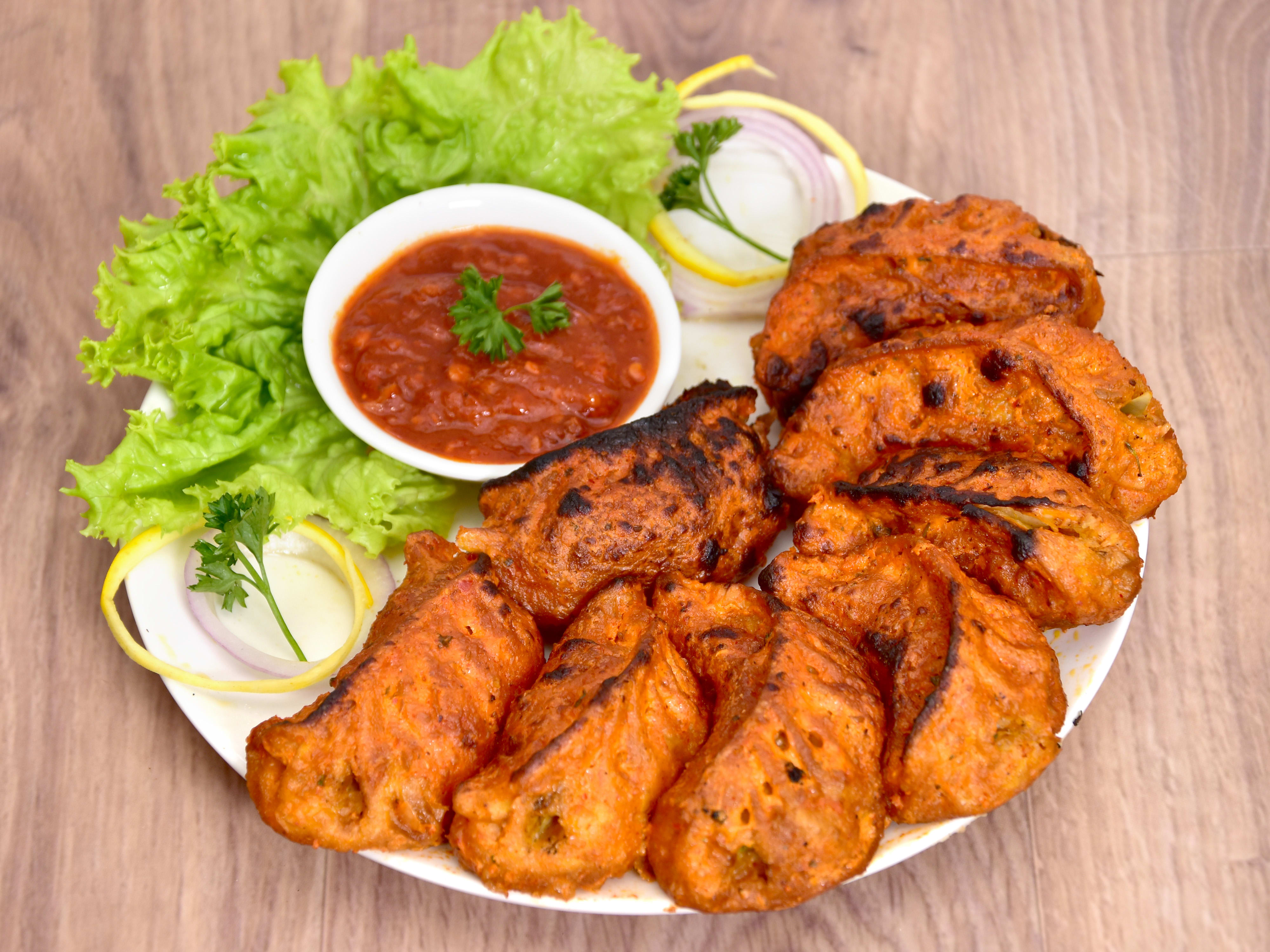 Momos Club - Logo