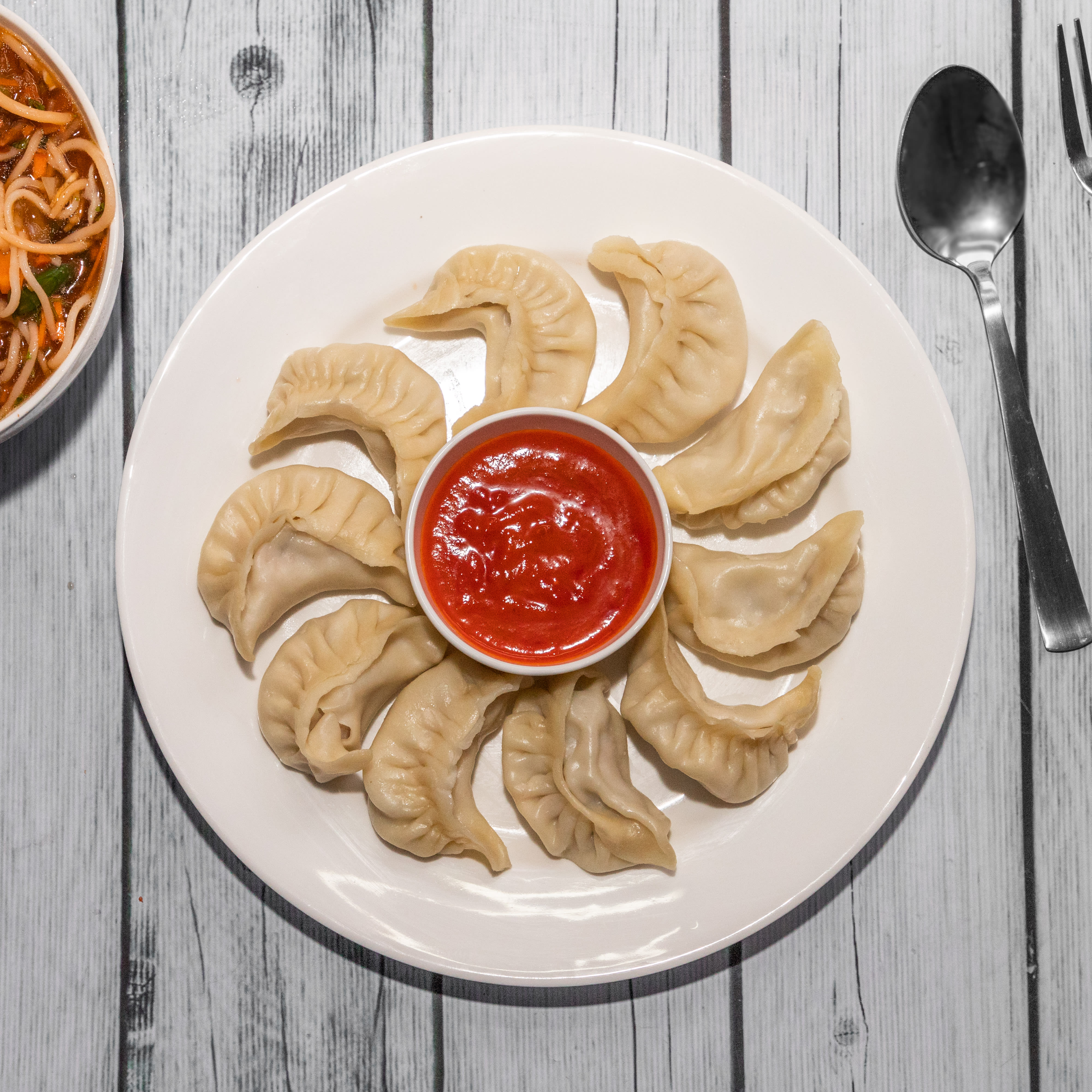 Momos Food Stop - Logo