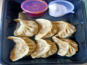Momos From Darjeeling - Logo